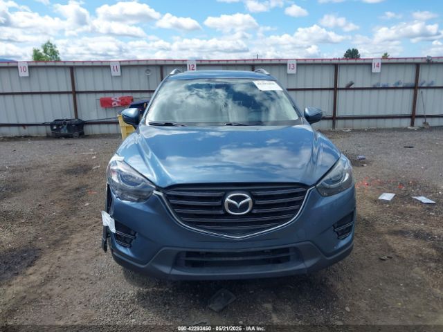 JM3KE4DY8G0621473 Mazda py