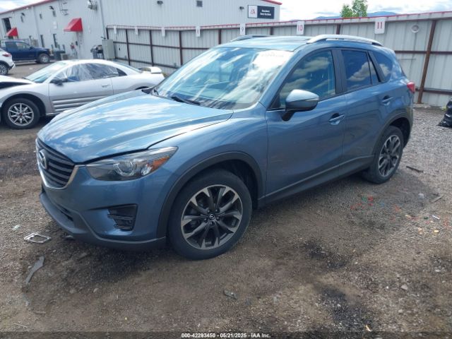JM3KE4DY8G0621473 Mazda py