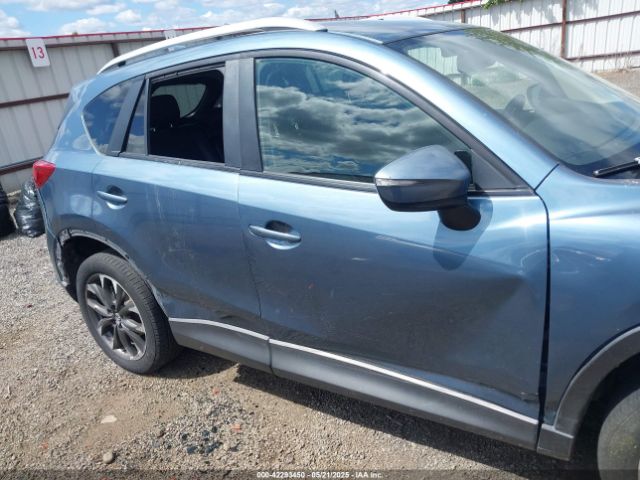 JM3KE4DY8G0621473 Mazda py