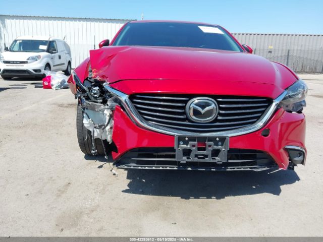 JM1GL1W56H1120485 Mazda py