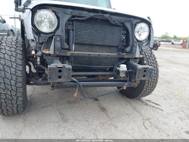 1C4BJWDG0GL142311 Jeep Wrangler Unlimited Sport