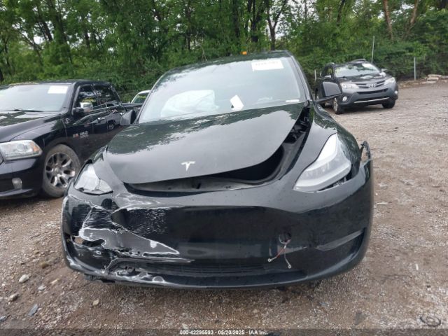 5YJYGDEF9MF250203 Tesla 2021