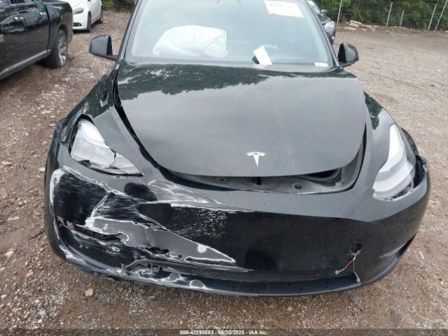5YJYGDEF9MF250203 Tesla 2021