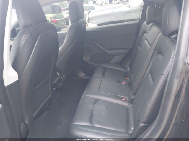 5YJYGDEF9MF250203 Tesla 2021