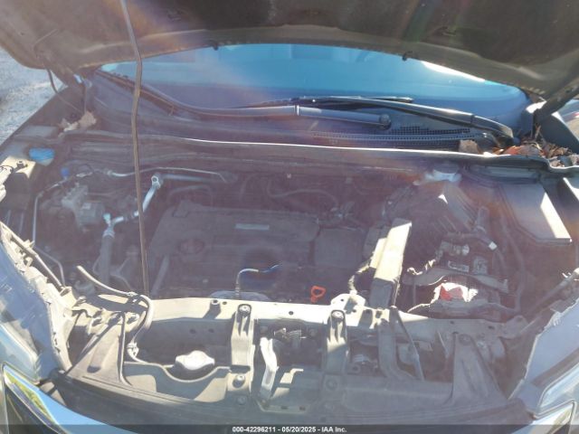 2HKRM4H34GH671427 Honda CR-V LX