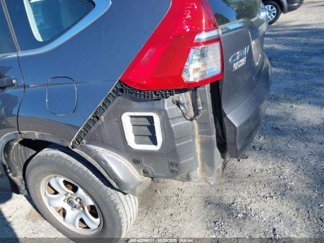 2HKRM4H34GH671427 Honda CR-V LX
