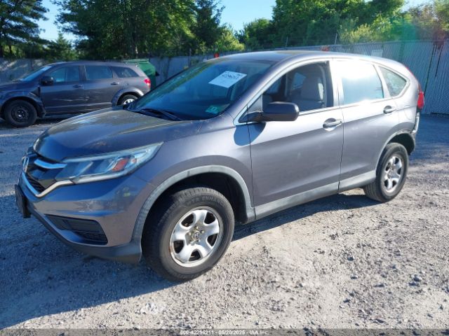 2HKRM4H34GH671427 Honda CR-V LX