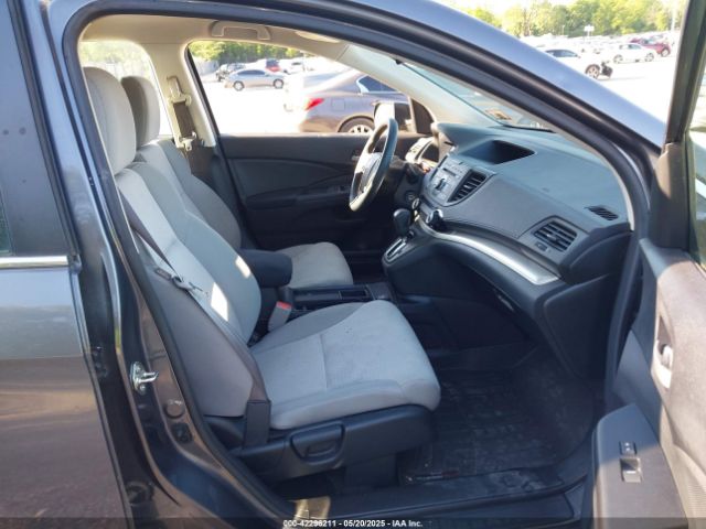 2HKRM4H34GH671427 Honda CR-V LX