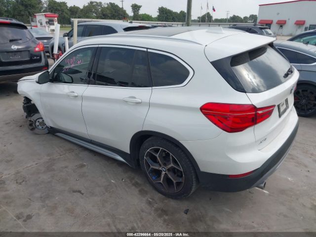 2019 BMW X1 WBXHU7C5XK3H45207 Photo 2