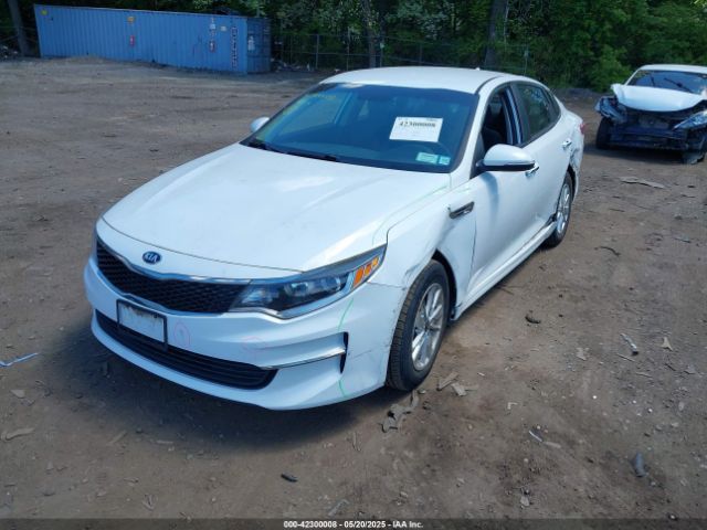 5XXGT4L32GG015594 KIA Optima Lx