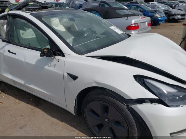 5YJ3E1EB9NF155394 Tesla 2022