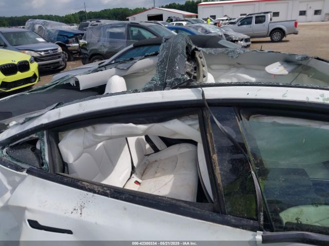 5YJ3E1EB9NF155394 Tesla 2022