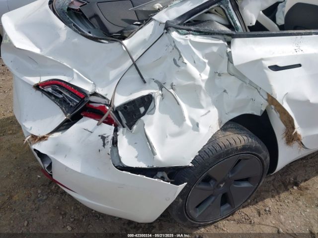 5YJ3E1EB9NF155394 Tesla 2022