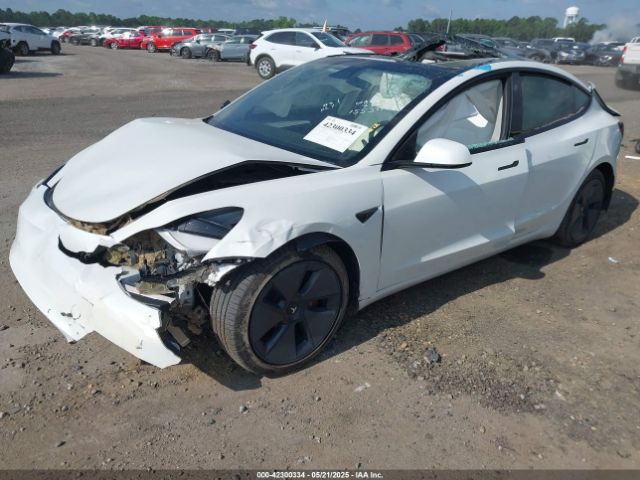 5YJ3E1EB9NF155394 Tesla 2022