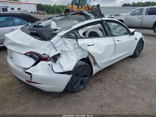 5YJ3E1EB9NF155394 Tesla 2022