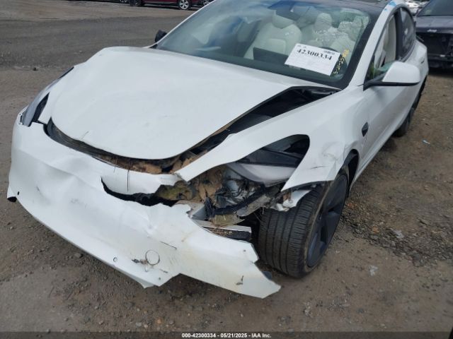 5YJ3E1EB9NF155394 Tesla 2022