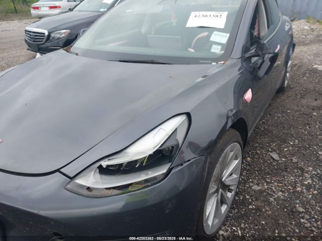 5YJ3E1EA5NF185905 Tesla 2022