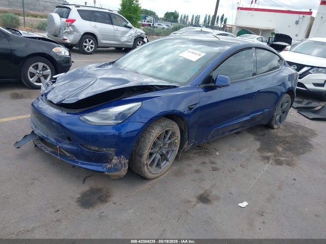 2021 TESLA MODEL 3 5YJ3E1EBXMF054945 Photo 1