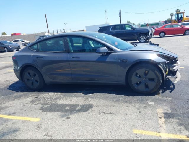 5YJ3E1EAXNF117762 Tesla 2022
