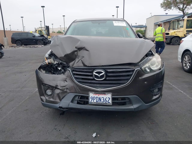 JM3KE2CY6G0774603 Mazda py