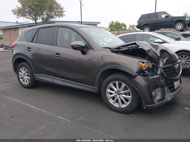 JM3KE2CY6G0774603 Mazda py