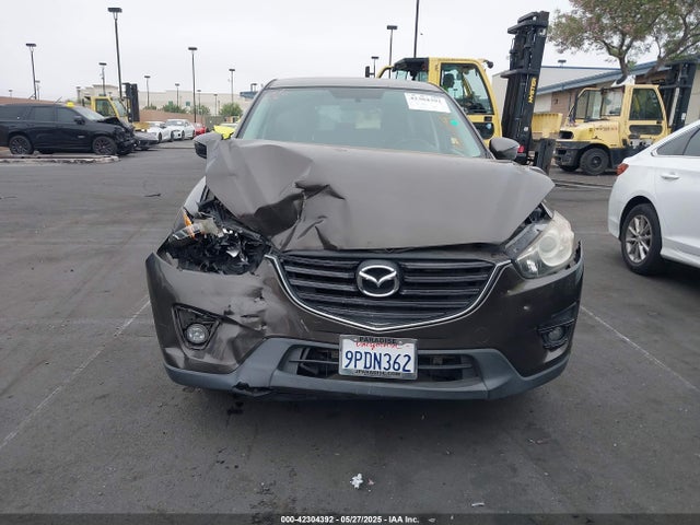 JM3KE2CY6G0774603 Mazda py