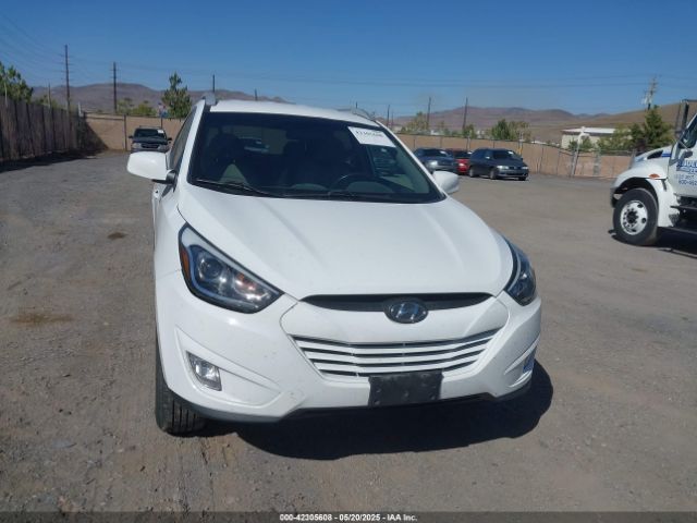 KM8JUCAG3EU807730 Hyundai TUCSON SE