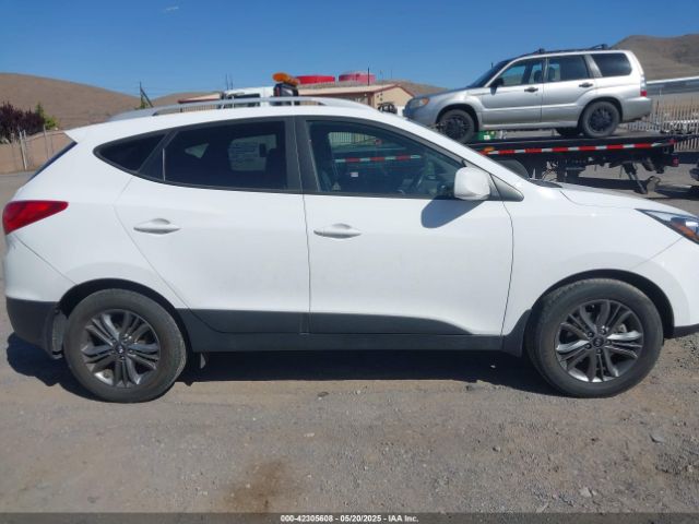 KM8JUCAG3EU807730 Hyundai TUCSON SE