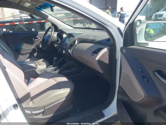 KM8JUCAG3EU807730 Hyundai TUCSON SE