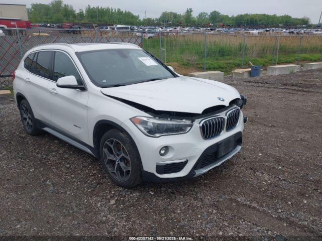 2016 BMW X1 WBXHT3C3XG5F67062