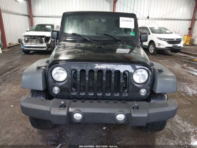 1C4HJWDG5FL670693 Jeep Wrangler Unlimited Sport