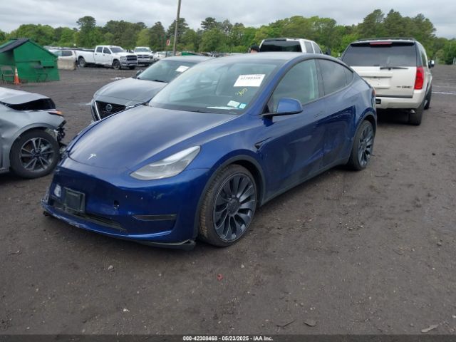 2024 TESLA MODEL Y 7SAYGDEF1RA265382 Photo 1