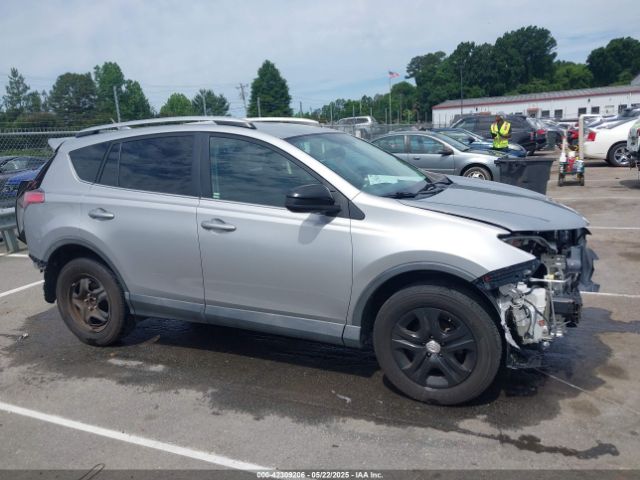 2T3ZFREV4GW263595 Toyota RAV4 LE