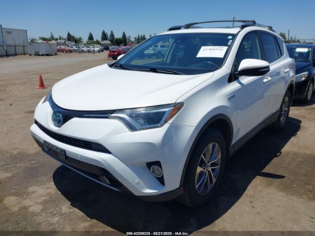 JTMRJREV8JD241375 Toyota Rav4 Hybrid Xle