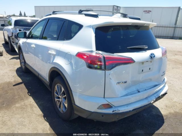 JTMRJREV8JD241375 Toyota Rav4 Hybrid Xle