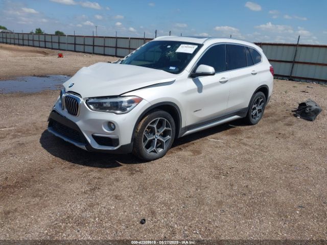2017 BMW X1 WBXHT3C33H5F76719 Photo 1
