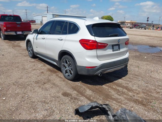 2017 BMW X1 WBXHT3C33H5F76719 Photo 2