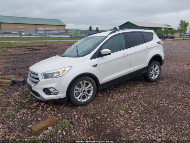 2018 FORD ESCAPE 1FMCU9GD1JUC16007 Photo 1