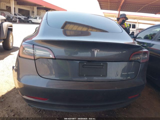 5YJ3E1EB9NF167142 Tesla 2022