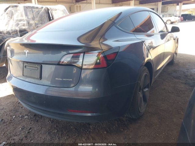 5YJ3E1EB9NF167142 Tesla 2022