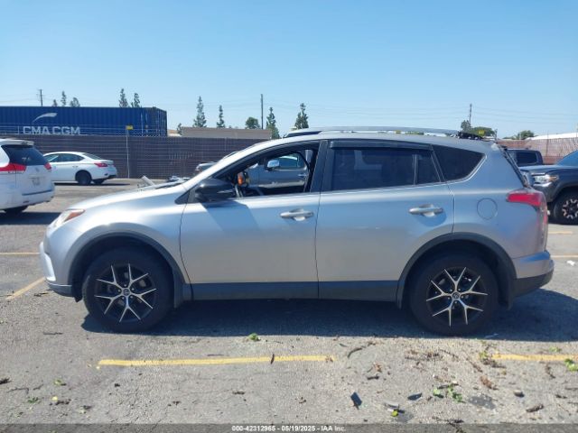 JTMNFREV1JJ195728 Toyota RAV4 SE