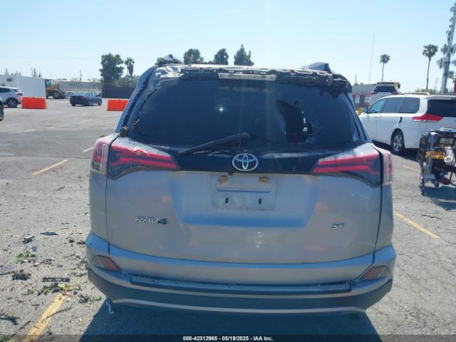 JTMNFREV1JJ195728 Toyota RAV4 SE