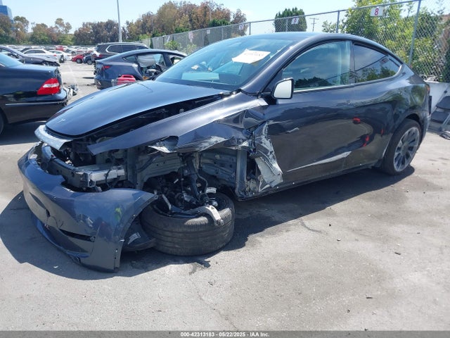 2024 TESLA MODEL Y 7SAYGDEE2RF165012 Photo 1