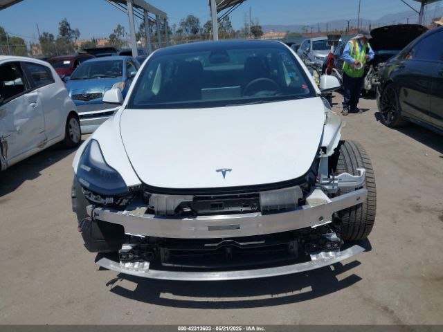 5YJ3E1EA6NF376605 Tesla 2022
