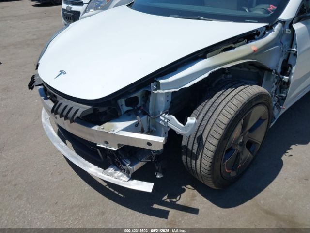 5YJ3E1EA6NF376605 Tesla 2022