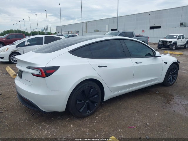 5YJ3E1EBXRF770011 Tesla 2024