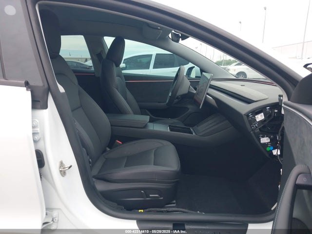 5YJ3E1EBXRF770011 Tesla 2024