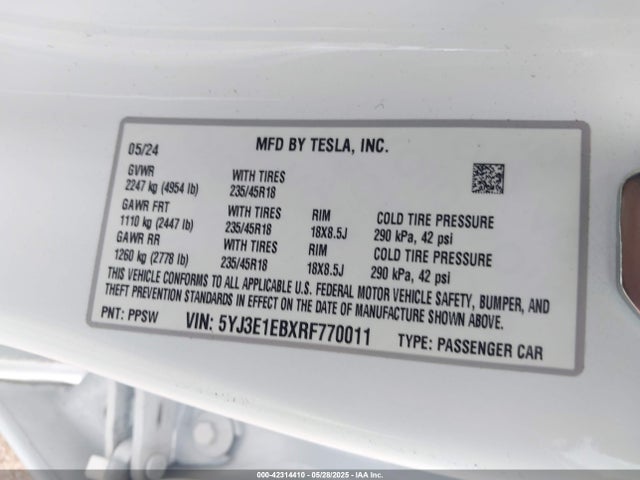 5YJ3E1EBXRF770011 Tesla 2024