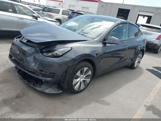 2023 TESLA MODEL Y 7SAYGDEE7PF852113 Photo 1