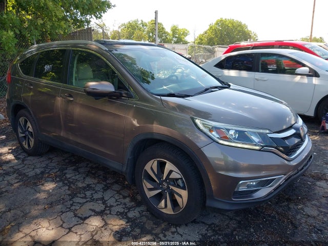 Auction sale of the 2016 Honda Cr-v Touring, vin: 5J6RM3H91GL018008, lot number: 42315256